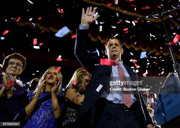 From right to left: Marty Walsh celebrates with his longtime partner Lorrie Higgins, her daughter, Lauren, and his mother, Mary, at his Election...