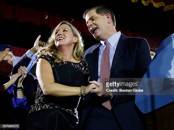 Marty Walsh celebrates with his longtime partner Lorrie Higgins at his Election Night party at the Park Plaza hotel in Boston, Nov. 5, 2013.