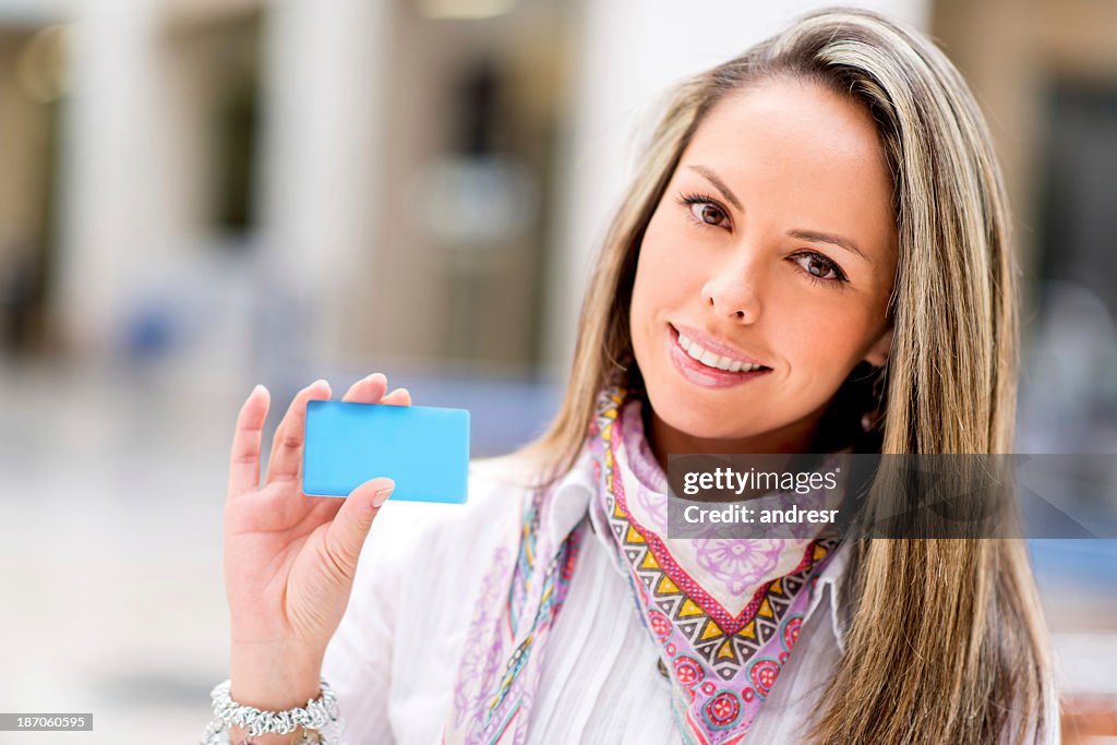 Woman holding a credit card