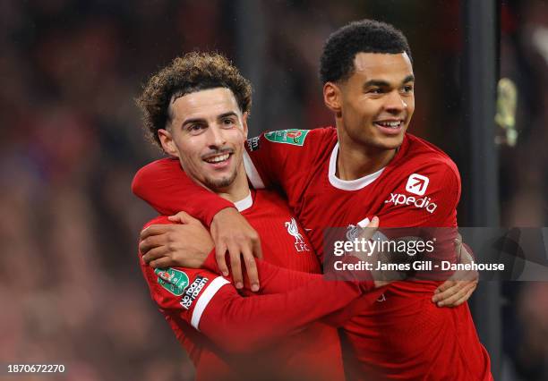 Curtis Jones of Liverpool celebrates with Cody Gakpo after scoring their second goal during the Carabao Cup Quarter Final match between Liverpool and...