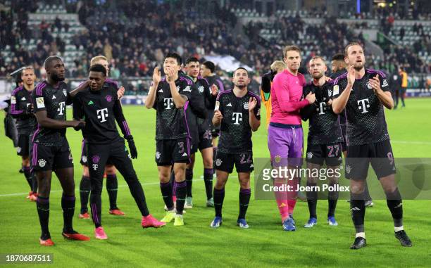 Players of Bayern Munich applaud the fans following the team's victory during the Bundesliga match between VfL Wolfsburg and FC Bayern München at...