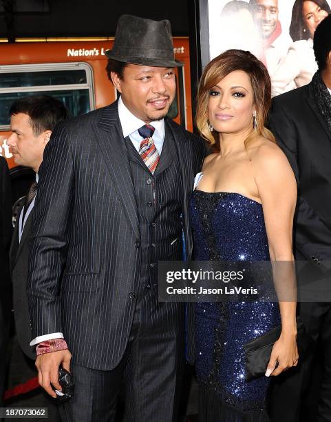 Actor Terrence Howard and actress Melissa De Sousa attend the premiere of "The Best Man Holiday" at TCL Chinese Theatre on November 5, 2013 in...