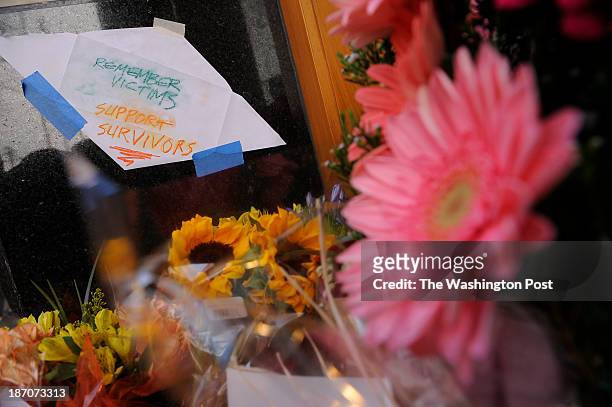 Makeshift memorial sits outside the Lululemon Athletica store in Bethesda, MD on March 14, 2011 after Jayna Murray was killed and another woman...