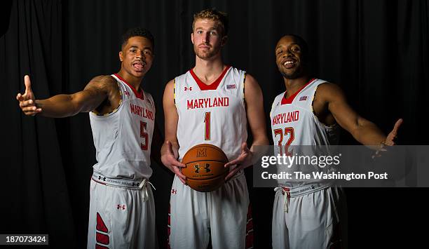 Portrait of Maryland juniors, Nick Faust, left, Evan Smotrycz, center, and Dez Wells, right, during media day at the Comcast Center on the campus of...