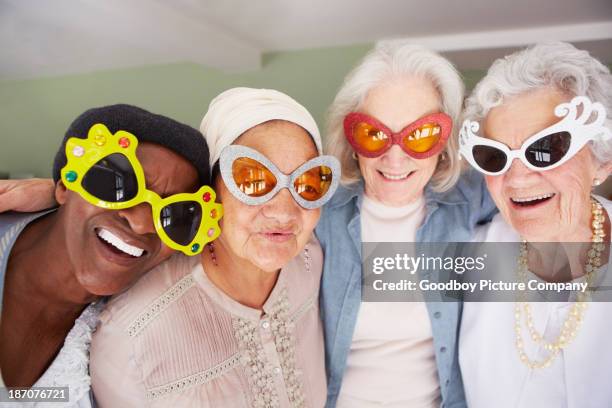 your grandma can never be this cool! - seniors having fun stockfoto's en -beelden
