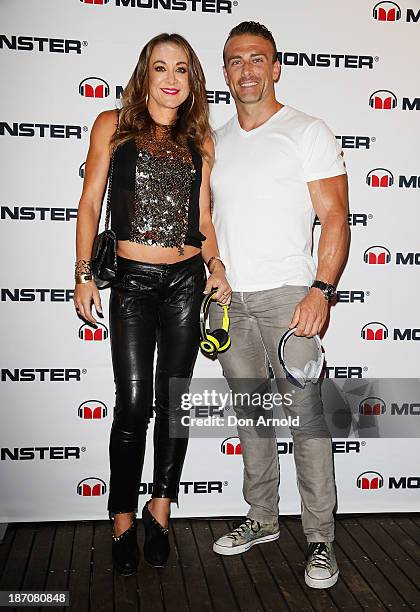 Michelle Bridges and Steve Willis pose at the Monster Headphones Launch Party at The Ivy on November 6, 2013 in Sydney, Australia.