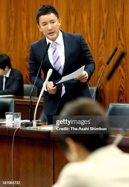 Upper House lawmaker Taro Yamamoto speaks during a cabinet committee at the Diet Building on November 5, 2013 in Tokyo, Japan. Yamamoto, criticized...