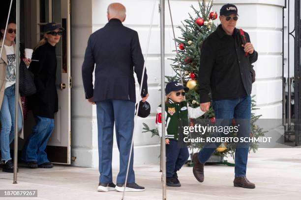 President Joe Biden , his son Hunter , his grandson Beau , Hunter's wife Melissa Cohen Biden and Ashley Biden leave the White House to board Marine 1...