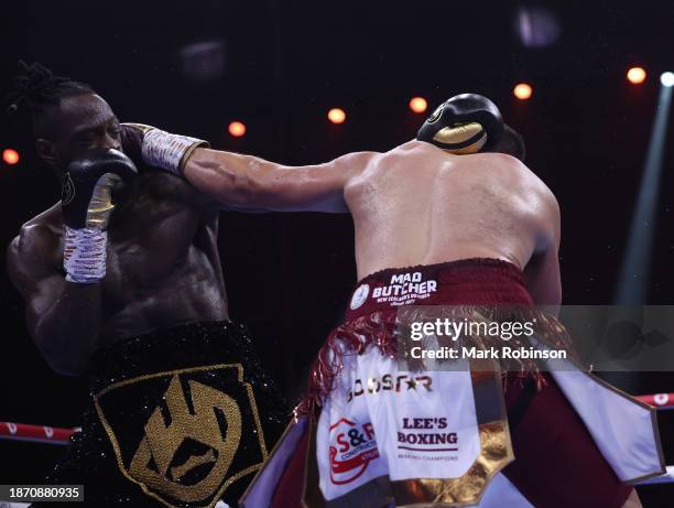 Deontay Wilder exchanges punches with Joseph Parker during a heavyweight fight at the Day of Reckoning event at Kingdom Arena on December 23, 2023 in...