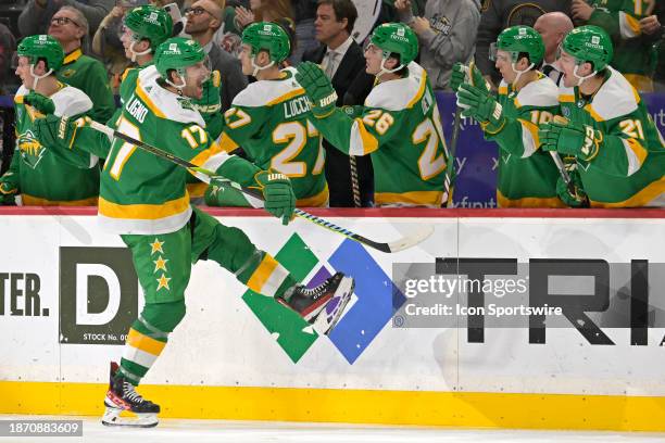 Minnesota Wild Left Wing Marcus Foligno celebrates his goal during the third period of an NHL game between the Minnesota Wild and Boston Bruins on...