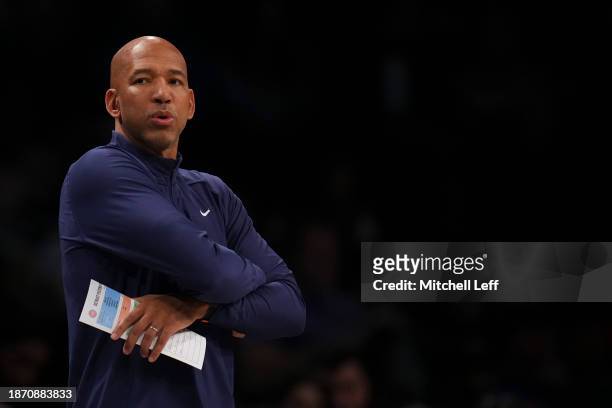 Head coach Monty Williams of the Detroit Pistons looks on against the Brooklyn Nets in the first half at Barclays Center on December 23, 2023 in the...