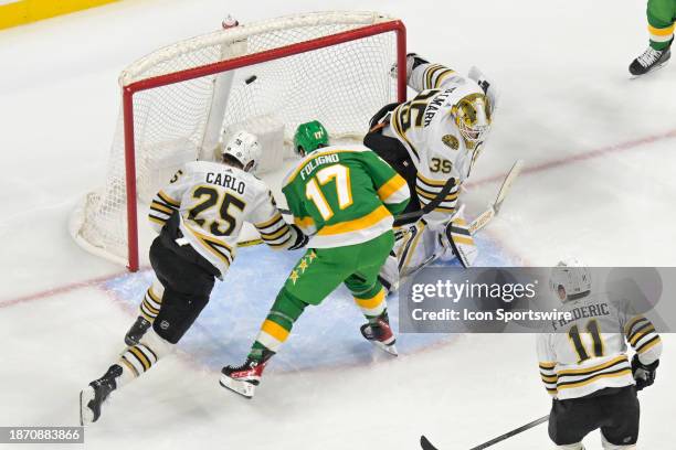 Minnesota Wild Left Wing Marcus Foligno puts the puck past Boston Bruins Goalie Linus Ullmark for a goal as Boston Bruins Defenceman Brandon Carlo...