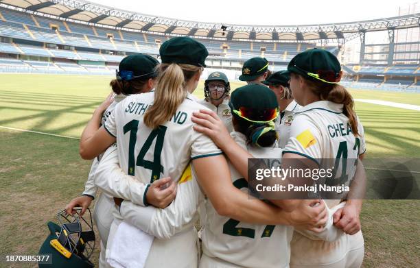 Players of Australia huddle during day four of the Women's Test Match between India and Australia at Wankhede Stadium on December 24, 2023 in Mumbai,...