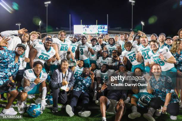 The Coastal Carolina Chanticleers post for a team photo after winning the Hawaii Bowl at Clarence T.C. Ching Athletics Complex against the San Jose...