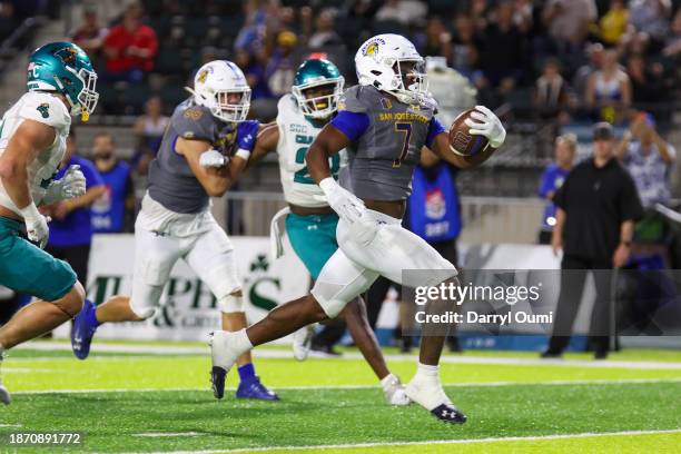 Quali Conley of the San Jose State Spartans runs into the end zone to score a touchdown during the first half of the Hawaii Bowl against the Coastal...