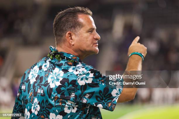 Head coach Tim Beck of the Coastal Carolina Chanticleers gestures to his players during the first half of the Hawaii Bowl against the San Jose State...