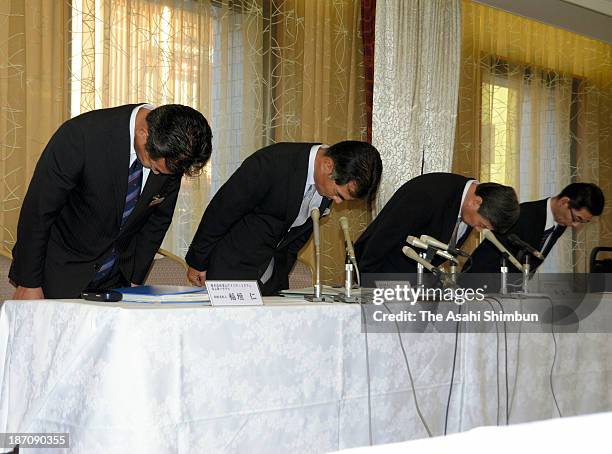 Executives of Toyama Daiichi Hotel and Daiichi Inn Shinminato bow for apology during a press conference on November 5, 2013 in Toyama, Japan. The...