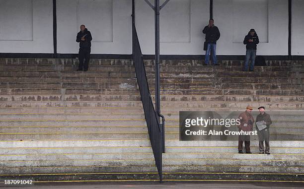Racegoers watch from one of the grandstands at Chepstow racecourse on November 06, 2013 in Chepstow, Wales.
