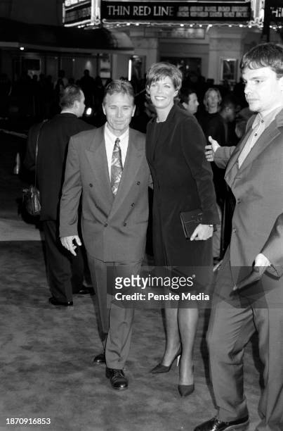 Fred Tillman and Kelly McGillis attend the local premiere of "At First Sight" at the Mann Bruin Theatre in the Westwood neighborhood of Los Angeles,...
