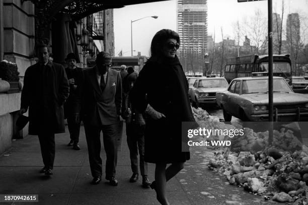 Outtake; Also ran in DNR 2/18/1969 p.19; Jacqueline Kennedy Onassis leaving Trader Vic's after having lunch with her husband Aristotle Onassis and...