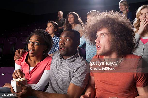 teenagers in cinema - movie audience stock pictures, royalty-free photos & images