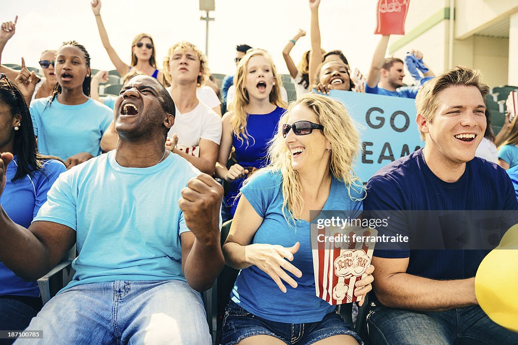 Fans cheer on sporting event