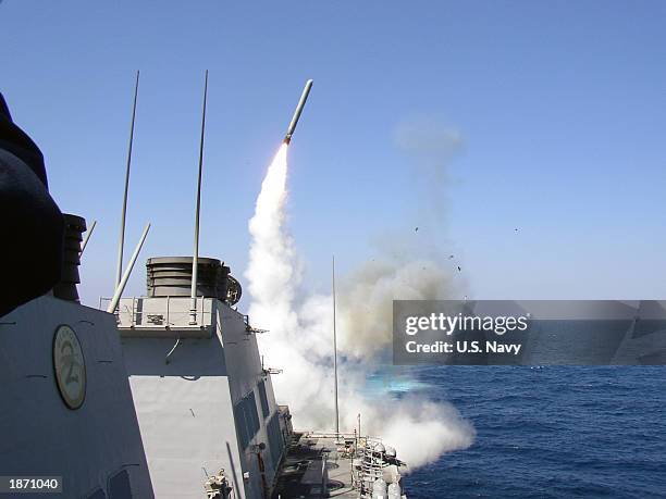 In this U.S. Navy handout photo, the guided missile destroyer USS Porter launches a Tomahawk Land Attack Missile toward Iraq during the initial...