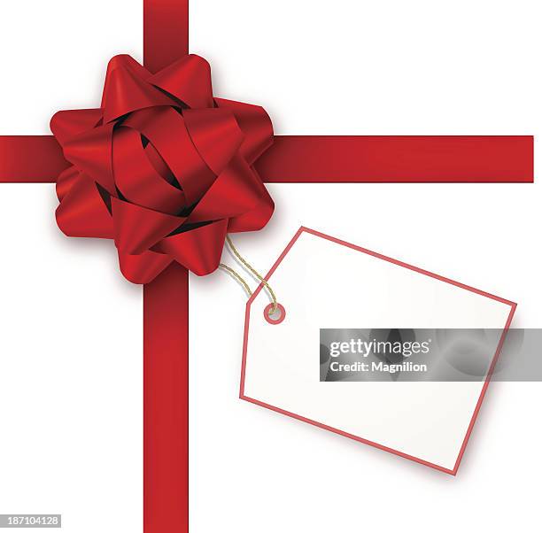 red gift bow with tag - red christmas bows stock illustrations