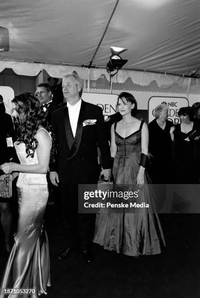 Bill Murray and Jennifer Butler attend the 56th Golden Globe Awards at the Beverly Hilton Hotel in Beverly Hills, California, on January 24, 1999.