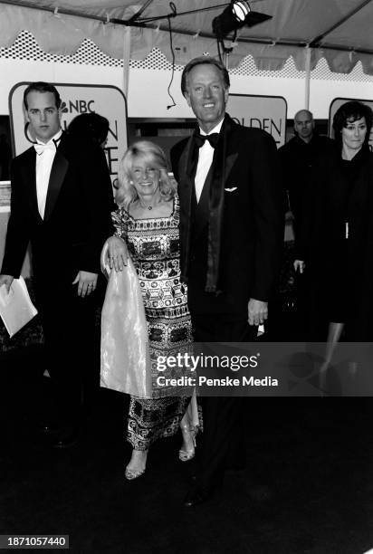 Portia Rebecca Crockett and Peter Fonda attend the 56th Golden Globe Awards at the Beverly Hilton Hotel in Beverly Hills, California, on January 24,...