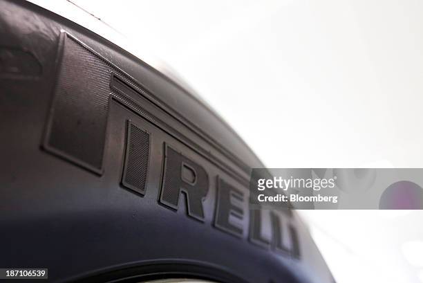 The company logo sits on a Pirelli TH:01 tire, manufactured by Pirelli SpA, following a news conference in London, U.K. On Wednesday, Nov. 6, 2013....