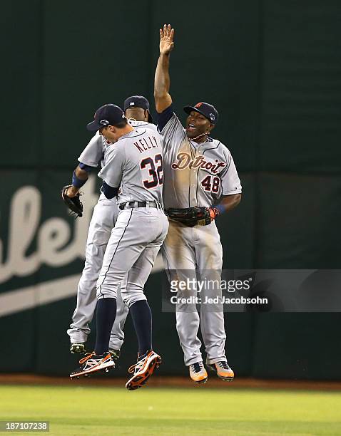 Torii Hunter of the Detroit Tigers celebrates with Don Kelly and Austin Jackson during Game One of the American League Division Series against the...