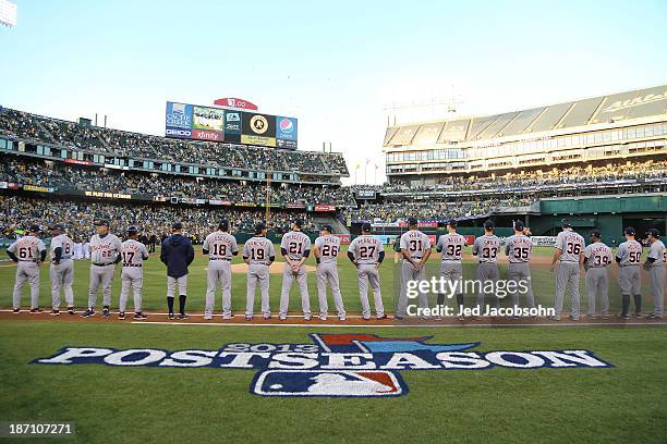 The Oakland Athletics line up during Game One of the American League Division Series against the Detroit Tigers on Friday, October 4, 2013 at Oc.o...