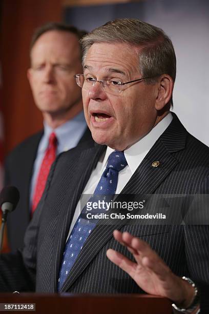 Sen. Robert Menendez and Sen. Pat Toomey hold a news conference to introduce the Start-Up Jobs and Innovation Act at the U.S. Capitol November 6,...