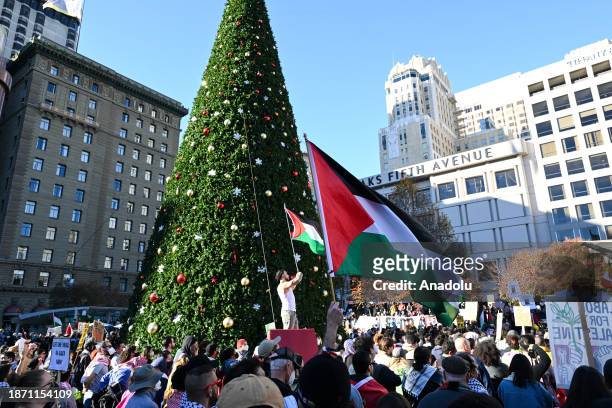 Pro-Palestinian demonstrators gather at Union Square for a ''Free Palestine'' rally to protest Israeli attacks on Gaza, day before Christmas in San...