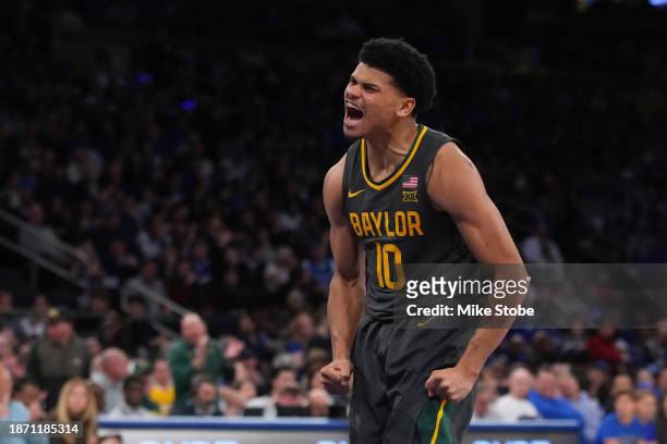 RayJ Dennis of the Baylor Bears celebrates after making a basket against the Duke Blue Devils during the Garden Classic at Madison Square Garden on...