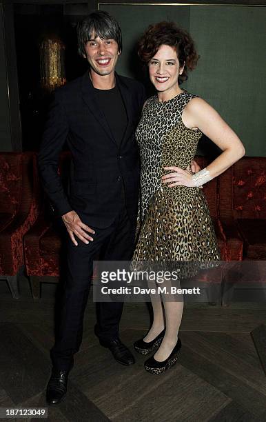Professor Brian Cox and wife Gia Milinovich attend a special screening of 'Gravity' hosted by Professor Brian Cox at The Mayfair Hotel on November 6,...