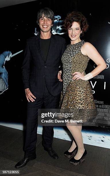 Professor Brian Cox and wife Gia Milinovich attend a special screening of 'Gravity' hosted by Professor Brian Cox at The Mayfair Hotel on November 6,...