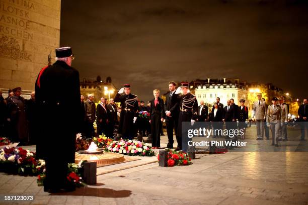 Wyatt Crockett of the New Zealand All Blacks lays a wreath at the Tomb of the Unknown Soldier at the Arc de Triomphe on November 6, 2013 in Paris,...