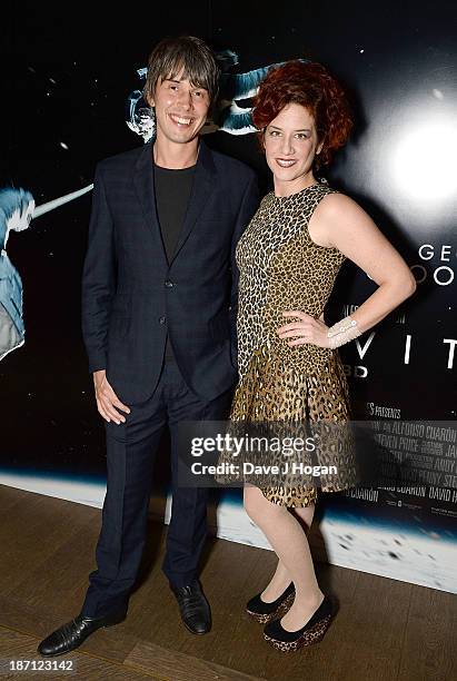 Brian Cox and Gia Milinovich attends a screening of "Gravity" hosted by Professor Brian Cox at The Mayfair Hotel on November 6, 2013 in London,...