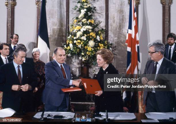 French Foreign Secretary Roland Dumas, French President Francois Mitterand , British Prime Minister Margaret Thatcher and British Foreign Secretary...