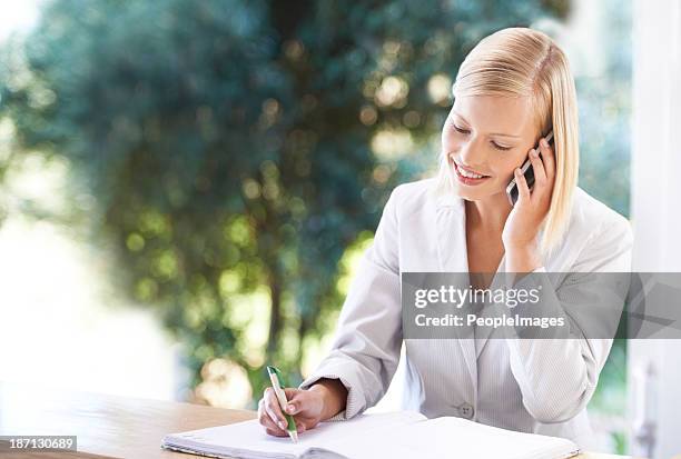 making her appointments for the day - guest book stock pictures, royalty-free photos & images