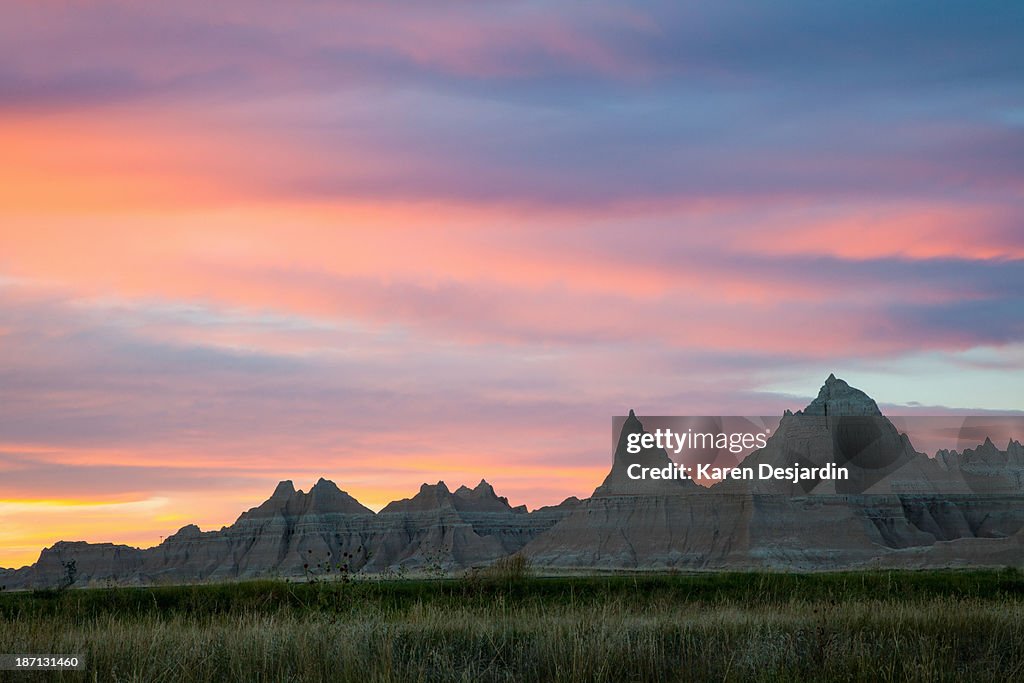 Sunset sky and rugged landscape, Badlands