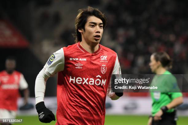 Junya Ito looks on during the Ligue 1 Uber Eats match between Stade de Reims and Havre AC at Stade Auguste Delaune on December 20, 2023 in Reims,...
