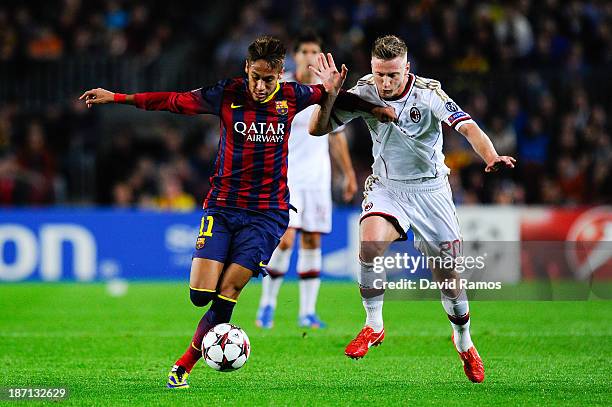 Neymar of FC Barcelona duels for the ball with Ignazio Abate of AC Milan during the UEFA Champions League Group H match Between FC Barcelona and AC...