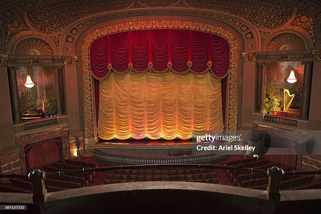 Empty seats in ornate movie theater