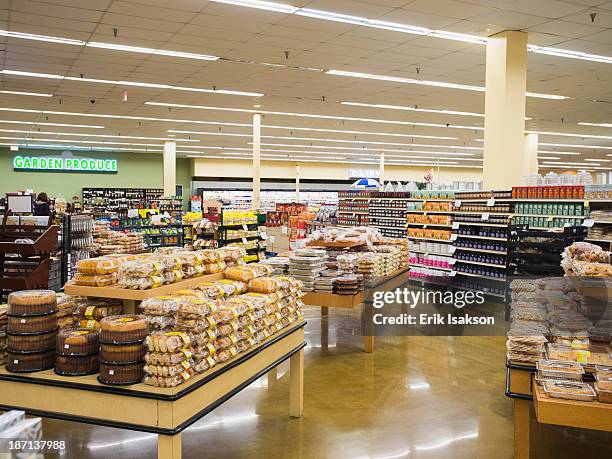 baked goods section of grocery store - supermarket interior stock pictures, royalty-free photos & images