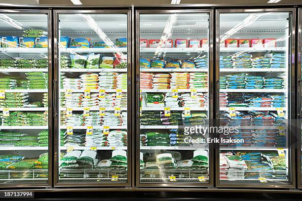 frozen section of grocery store - frozen food stock pictures, royalty-free photos & images