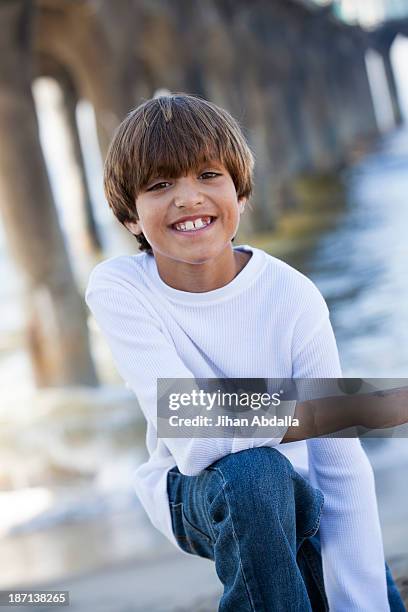 mixed race boy smiling - manhattan beach stock pictures, royalty-free photos & images
