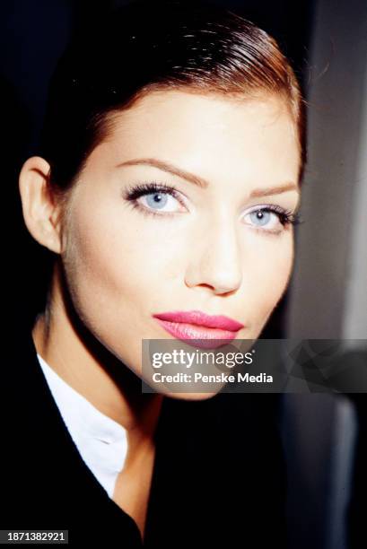 Model Emma Sjoberg backstage at the Gianfranco Ferre Spring 1995 Ready to Wear Runway Show on October 6 in Milan Italy.